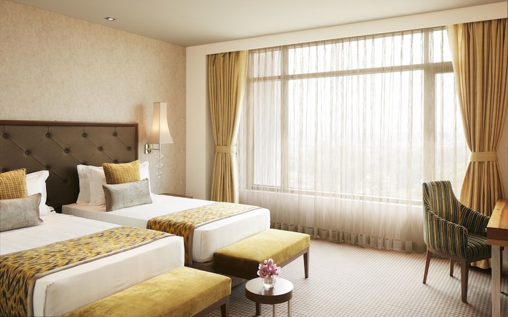 Imagen de la habitación del Hotel Taj Swarna. Foto 6