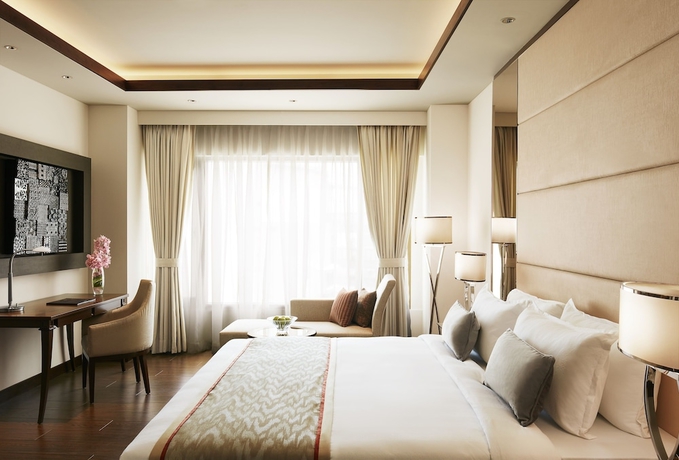 Imagen de la habitación del Hotel Taj Swarna. Foto 14