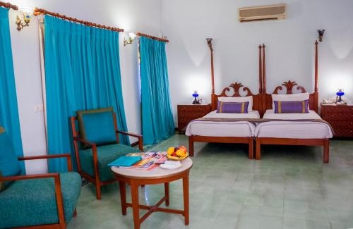 Imagen de la habitación del Hotel Taj Usha Kiran Palace, Gwalior. Foto 6