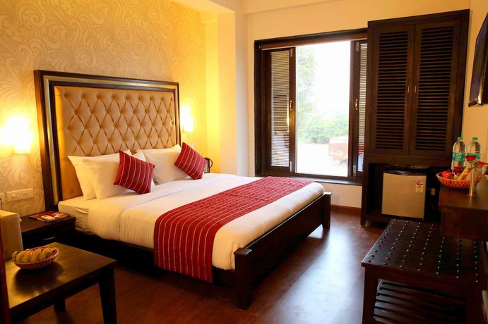 Imagen de la habitación del Hotel Taj Villa Agra. Foto 14