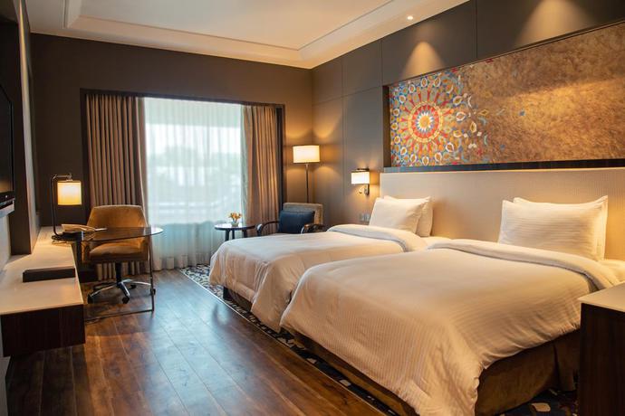 Imagen de la habitación del Hotel Taj and Convention Centre, Agra. Foto 8