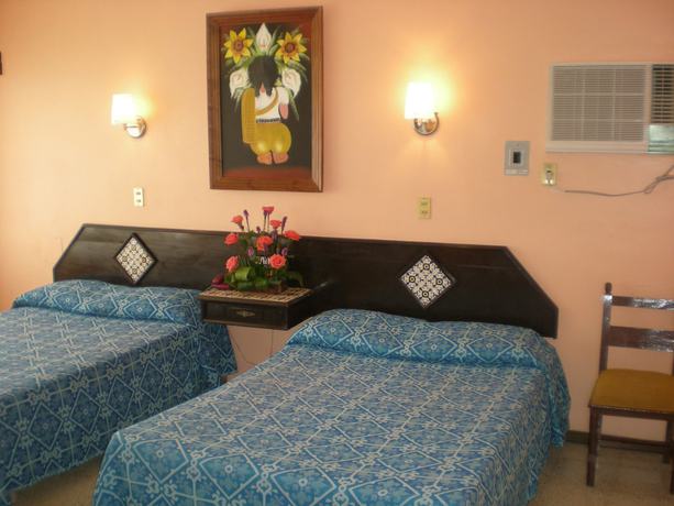 Imagen de la habitación del Hotel Taj&iacute;n. Foto 9