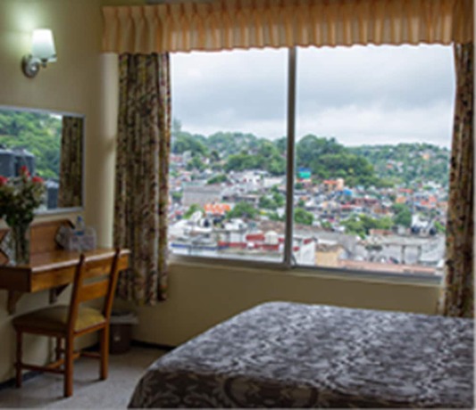 Imagen de la habitación del Hotel Taj&iacute;n. Foto 13