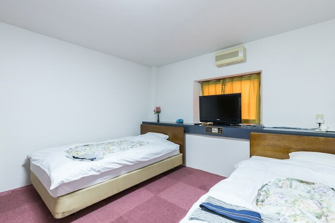 Imagen de la habitación del Hotel Takada Terminal. Foto 10