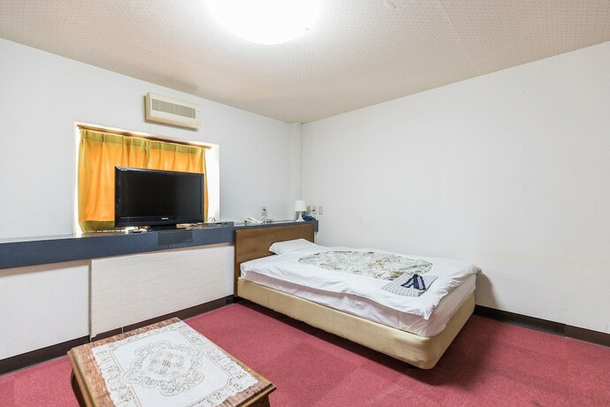 Imagen de la habitación del Hotel Takada Terminal. Foto 11