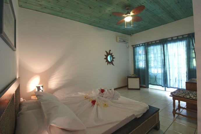 Imagen de la habitación del Hotel Takamaka Green Village. Foto 4