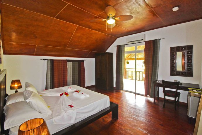 Imagen de la habitación del Hotel Takamaka Green Village. Foto 8