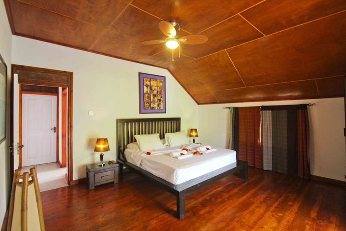 Imagen de la habitación del Hotel Takamaka Green Village. Foto 12