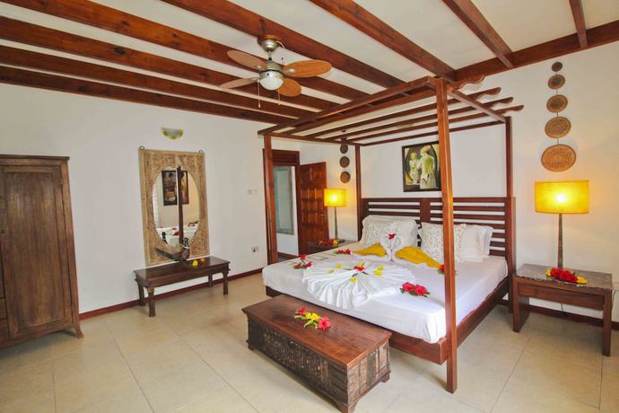 Imagen de la habitación del Hotel Takamaka Green Village. Foto 14
