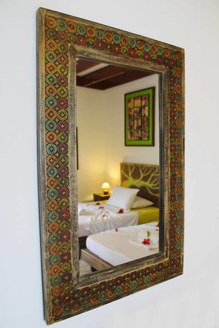 Imagen de la habitación del Hotel Takamaka Green Village. Foto 18