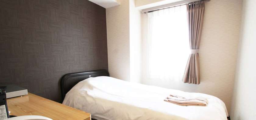 Imagen de la habitación del Hotel Takamatsu City. Foto 14