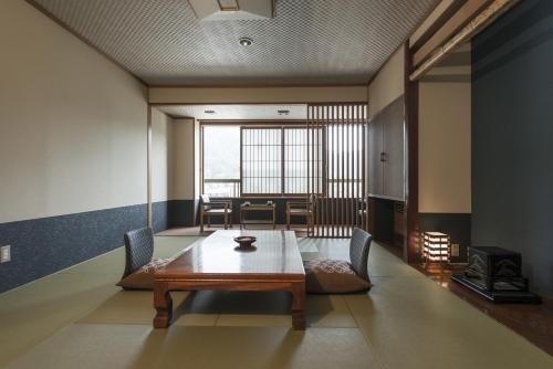 Imagen de la habitación del Hotel Takamiya Bettei Kuon. Foto 9