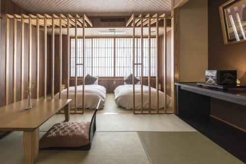 Imagen de la habitación del Hotel Takamiya Bettei Kuon. Foto 10