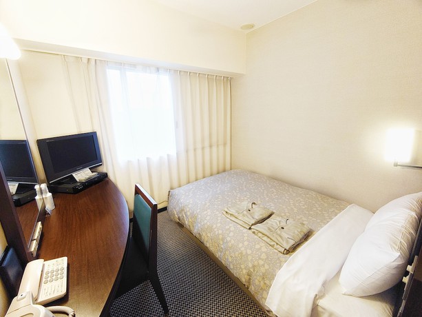 Imagen de la habitación del Hotel Takaoka Manten Ekimae. Foto 11