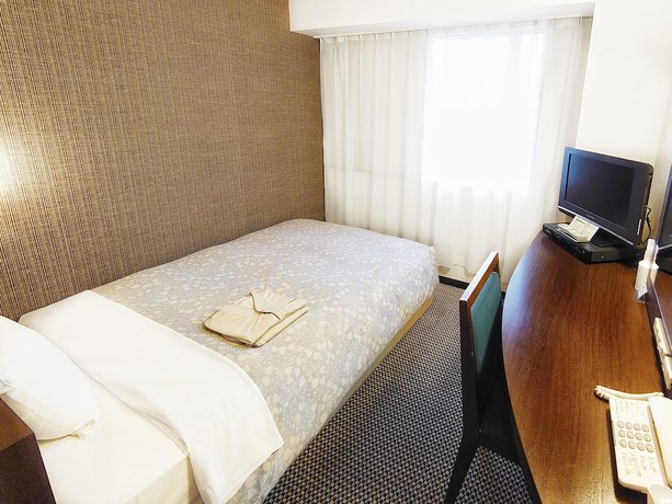 Imagen de la habitación del Hotel Takaoka Manten Ekimae. Foto 12