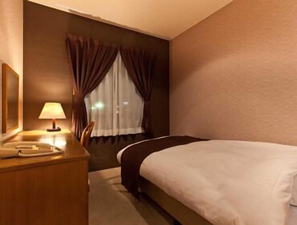 Imagen de la habitación del Hotel Takasago. Foto 15