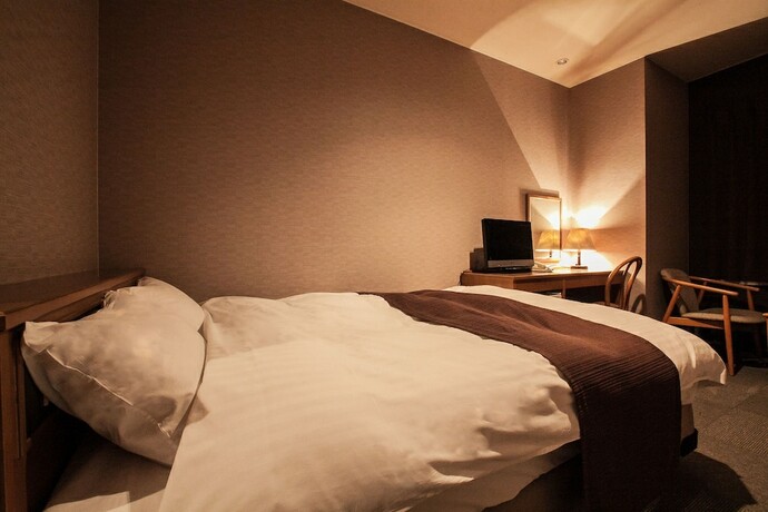 Imagen de la habitación del Hotel Takasago. Foto 18