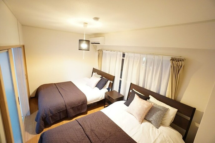 Imagen de la habitación del Hotel Takemura House Kyoubashi. Foto 20