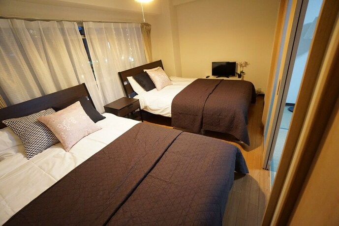 Imagen de la habitación del Hotel Takemura House Kyoubashi. Foto 28