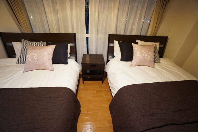 Imagen de la habitación del Hotel Takemura House Kyoubashi. Foto 30