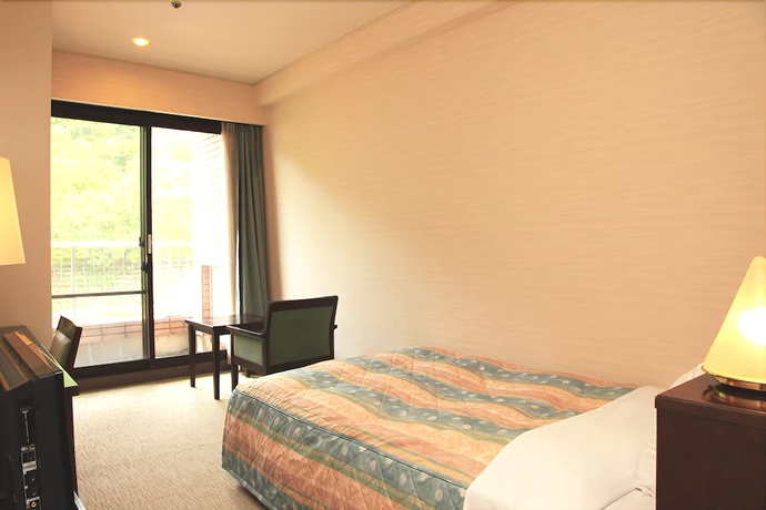 Imagen de la habitación del Hotel Takeo Century. Foto 7