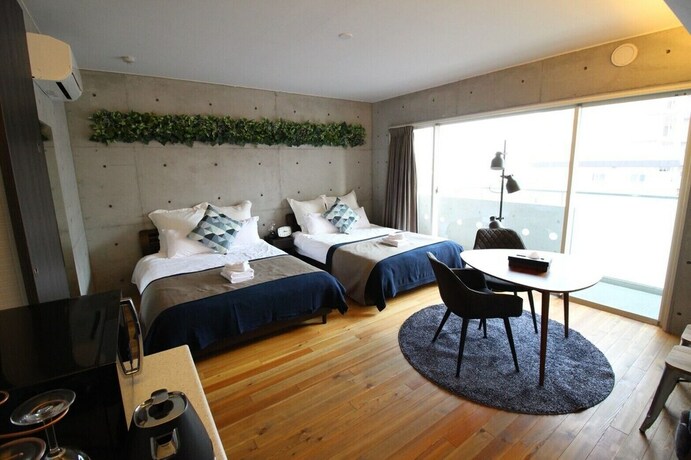 Imagen de la habitación del Hotel Taketo Stay Osakajo. Foto 30