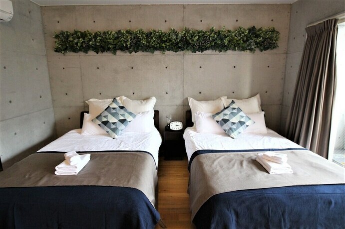 Imagen de la habitación del Hotel Taketo Stay Osakajo. Foto 32