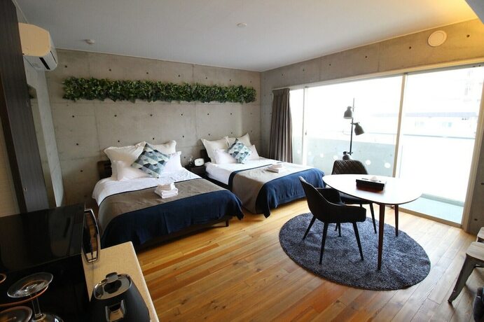 Imagen de la habitación del Hotel Taketo Stay Osakajo. Foto 35