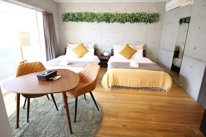 Imagen de la habitación del Hotel Taketo Stay Osakajo. Foto 38