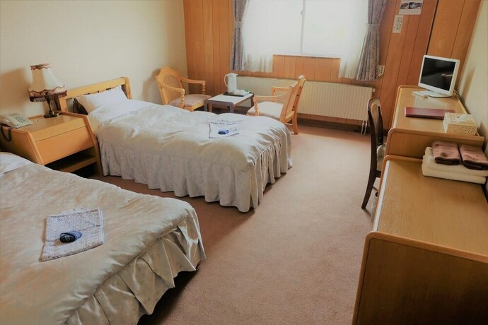 Imagen de la habitación del Hotel Takimoto. Foto 31