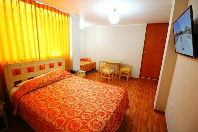 Imagen de la habitación del Hotel Takora Inn. Foto 6
