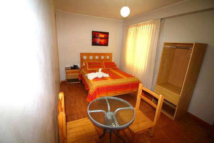 Imagen de la habitación del Hotel Takora Inn. Foto 10