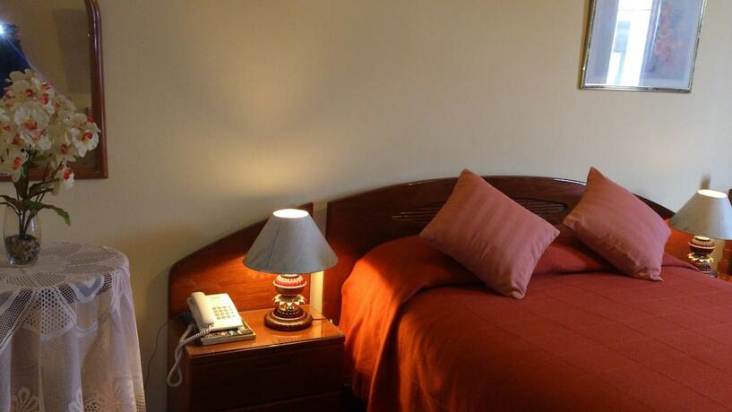 Imagen de la habitación del Hotel Takora Inn. Foto 18