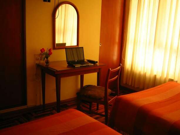 Imagen de la habitación del Hotel Takora Inn. Foto 23