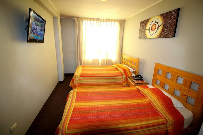 Imagen de la habitación del Hotel Takora Inn. Foto 25