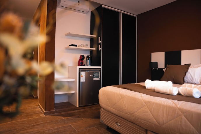 Imagen de la habitación del Hotel Takua Serrano. Foto 15