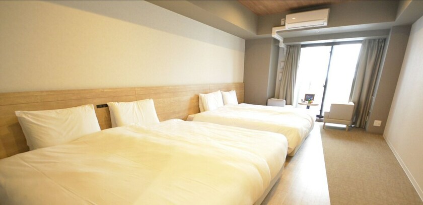 Imagen de la habitación del Hotel Takuto Shinsaibashi. Foto 23