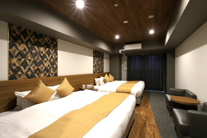 Imagen de la habitación del Hotel Takuto Shinsaibashi. Foto 24