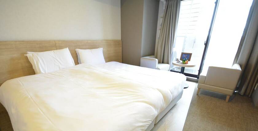 Imagen de la habitación del Hotel Takuto Shinsaibashi. Foto 25