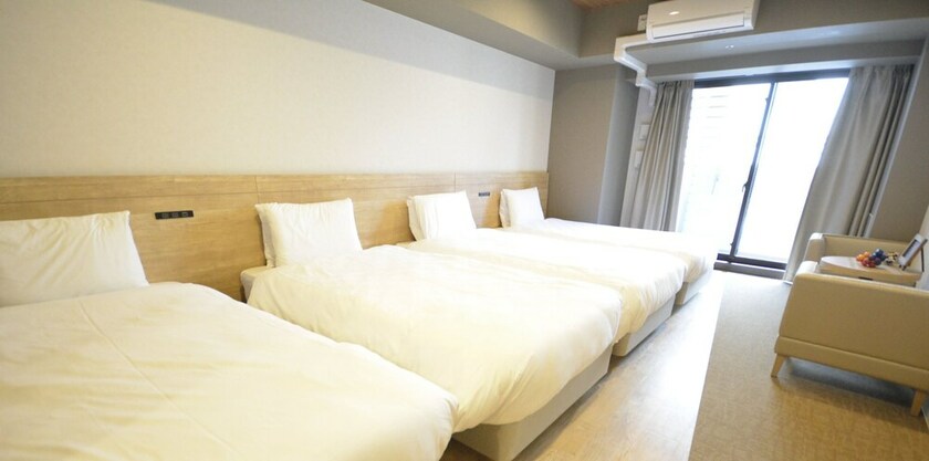 Imagen de la habitación del Hotel Takuto Shinsaibashi. Foto 30