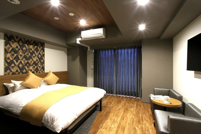 Imagen de la habitación del Hotel Takuto Shinsaibashi. Foto 31