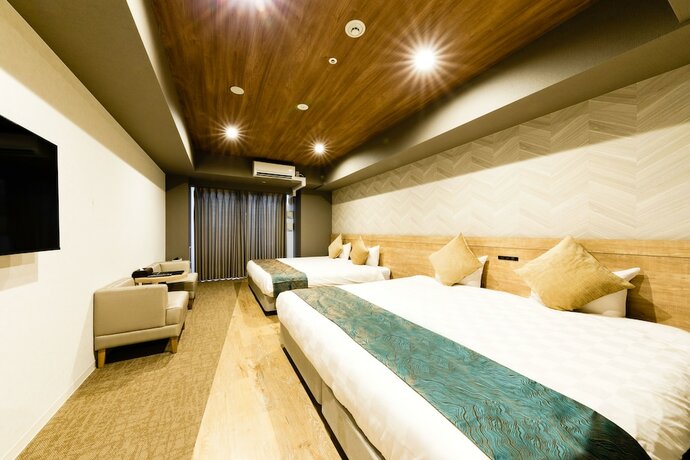 Imagen de la habitación del Hotel Takuto Shinsaibashi. Foto 32