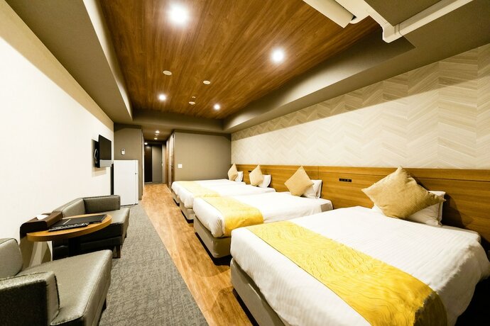 Imagen de la habitación del Hotel Takuto Shinsaibashi. Foto 35