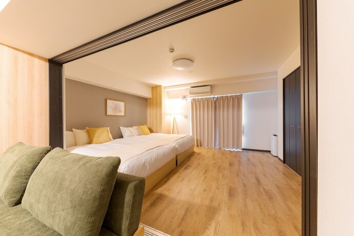 Imagen de la habitación del Hotel Takuto Stay Sakaisuji-honmachi. Foto 18