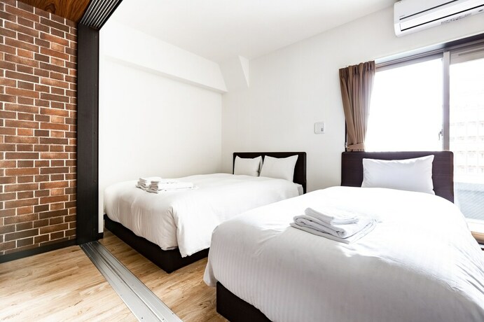 Imagen de la habitación del Hotel Takuto Stay Sakaisuji-honmachi. Foto 26