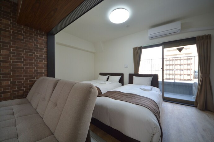 Imagen de la habitación del Hotel Takuto Stay Sakaisuji-honmachi. Foto 28