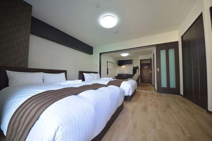 Imagen de la habitación del Hotel Takuto Stay Sakaisuji-honmachi. Foto 34