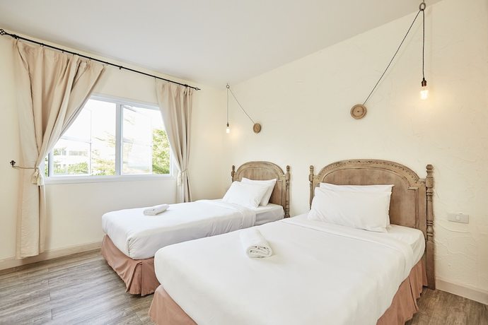 Imagen de la habitación del Hotel Talay and Villa. Foto 15