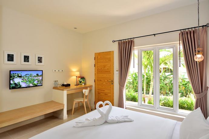 Imagen de la habitación del Hotel Talay and Villa. Foto 16