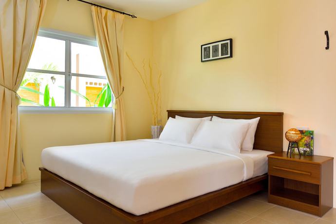 Imagen de la habitación del Hotel Talay and Villa. Foto 17